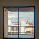 Ventana corrediza de aluminio en balcón Puebla